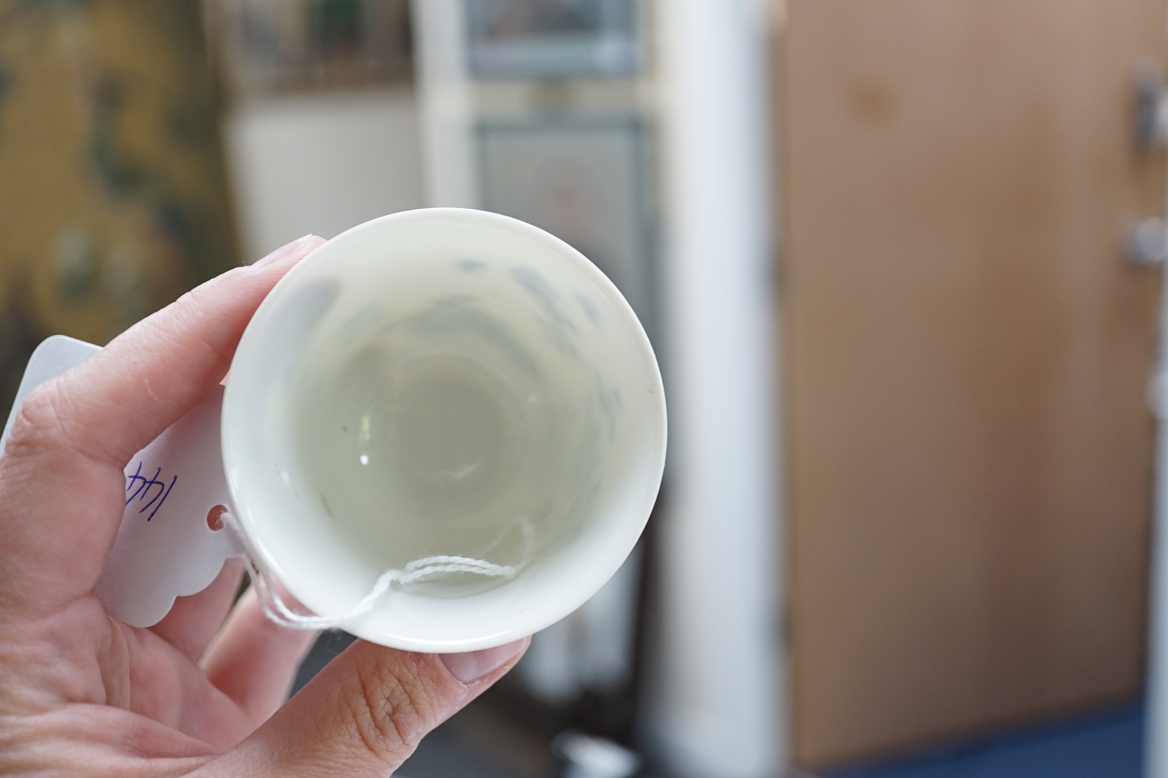 A Chinese blue and white 'month' cup, Kangxi mark, probably late 19th century